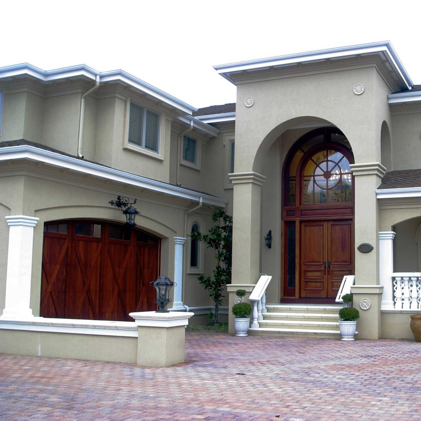 matching garage and entry doors on home