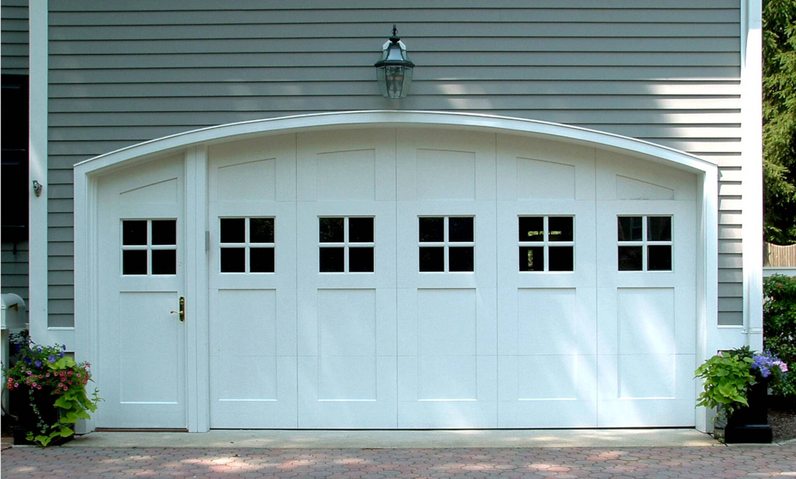 garage door with integrated service door